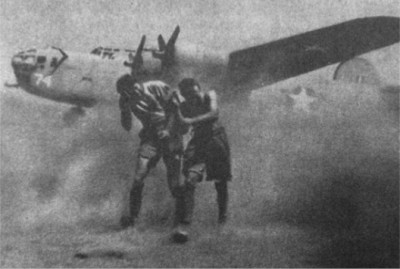 Airmen fighting sandstorm in desert of North Africa